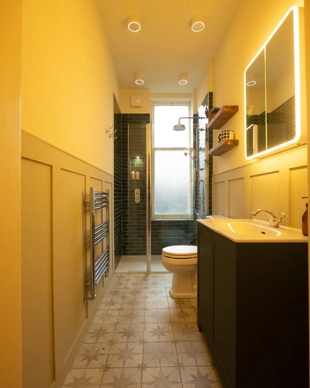 A green-tiled shower room fitted in Cardiff.